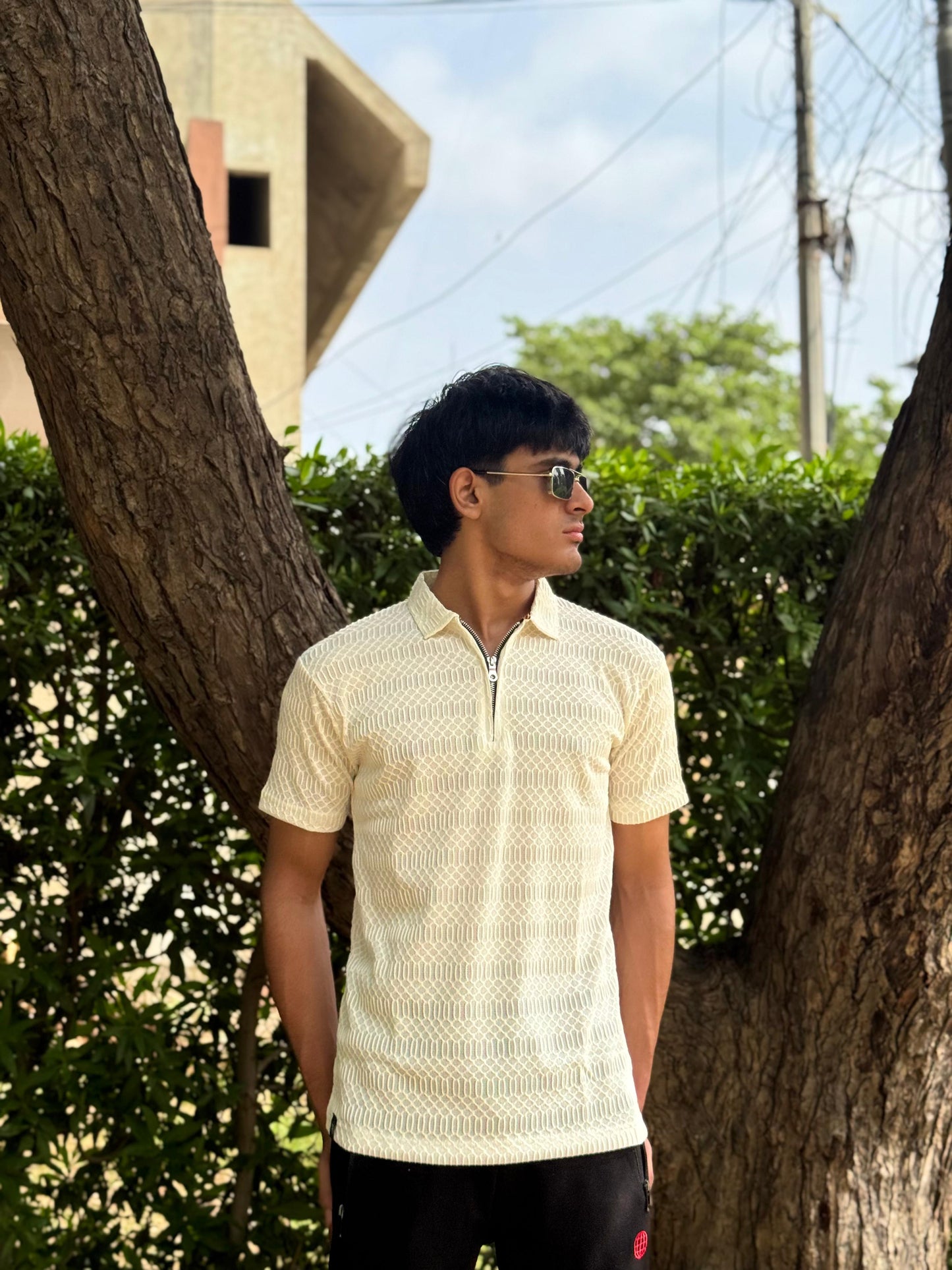 Off White Knitted Zip Polo design 1