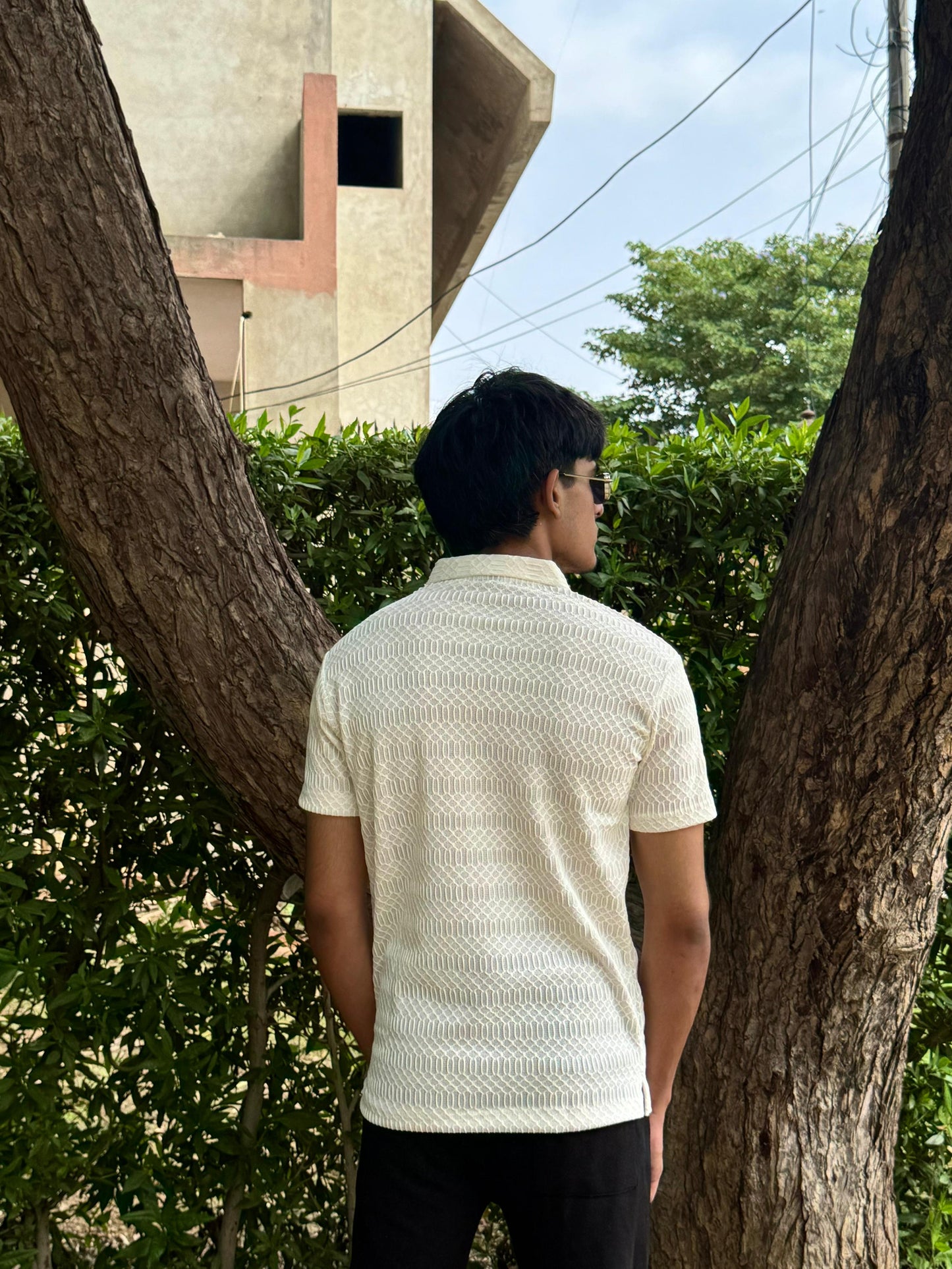 Off White Knitted Zip Polo design 1
