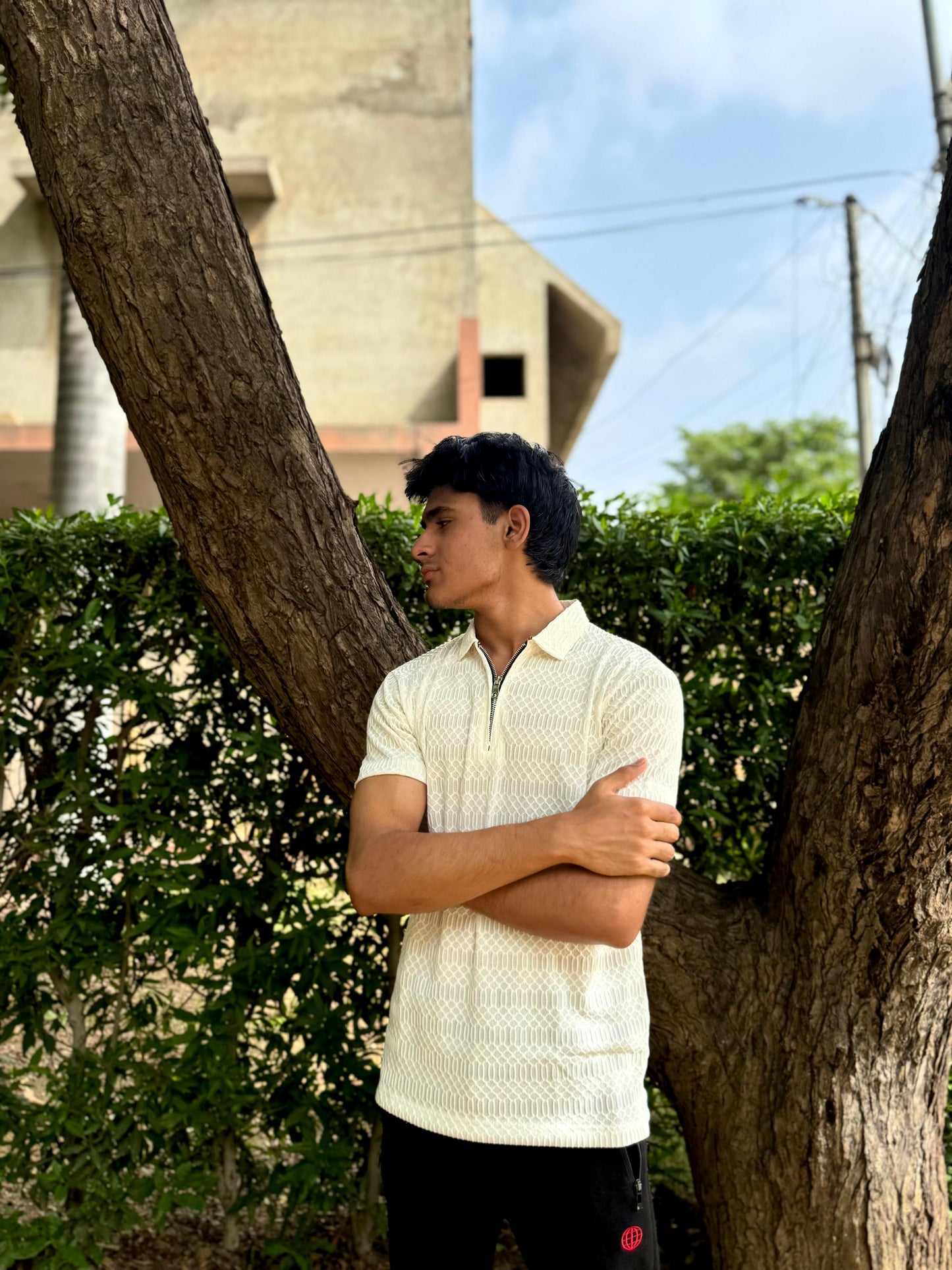 Off White Knitted Zip Polo design 1